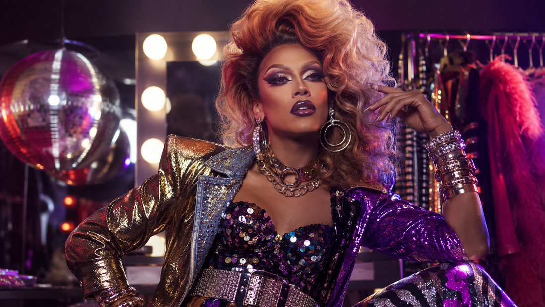 Drag queen in a retro-glam dressing room with wigs, makeup, jewelry and stagewear inspired by different decades.