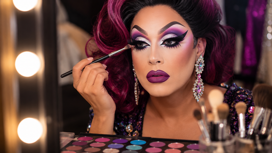 Drag queen with dramatic eye makeup, false eyelashes, sparkling eyeshadow and a glamorous stage-ready look.