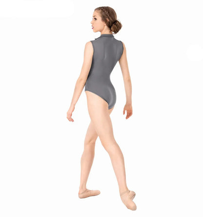Woman wearing a gray leotard on a white background
