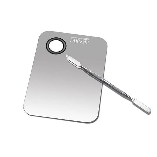 Metallic tool and mirror with 'IMAGIC' branding on a white background