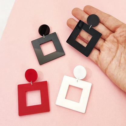 Stud Earrings Queen Square